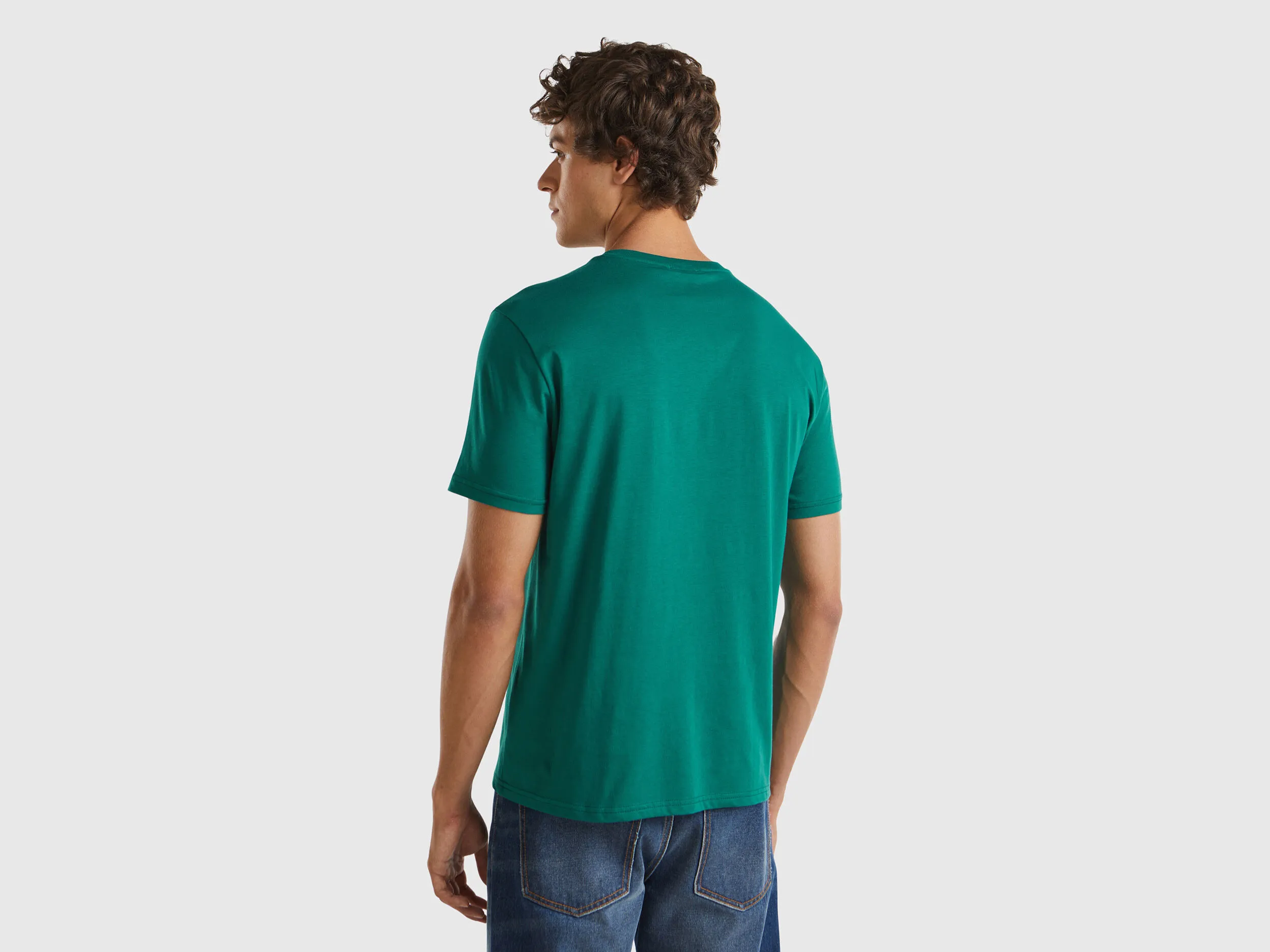 Camiseta verde oscuro de algodón orgánico con logotipo naranja