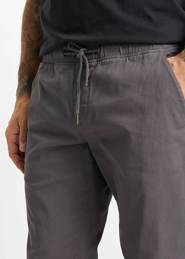 Pantalón elástico tipo chino de corte holgado con pernera recta pizarra